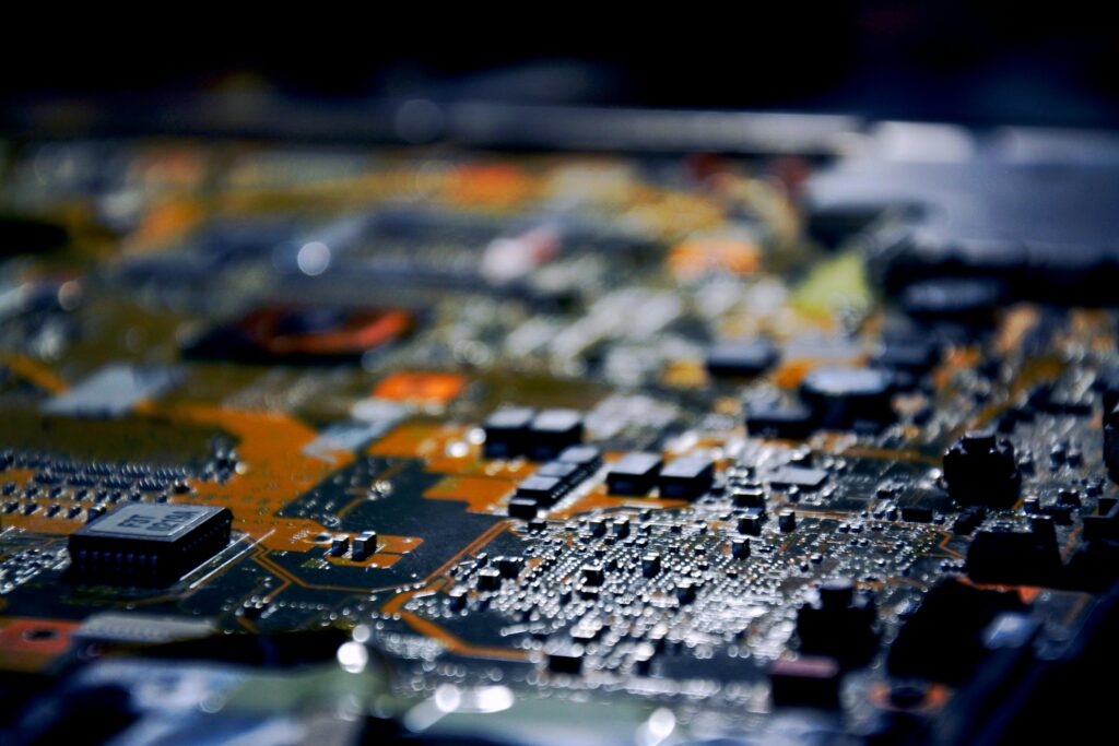 Detailed close-up view of electronic circuit board, showcasing modern technology.